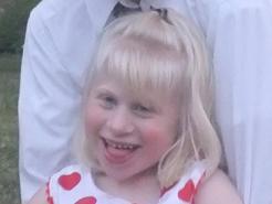 Ally, a girl with Angelman Syndrome