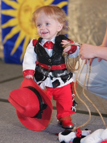 Lacie Mae in a cowgirl costume