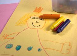 children's drawing and crayons