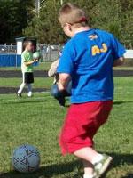 Boy playing soccer