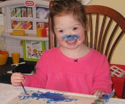 Madeline with blue paint on her nose