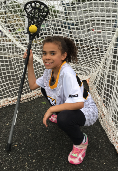 Makayla with a lacrosse stick